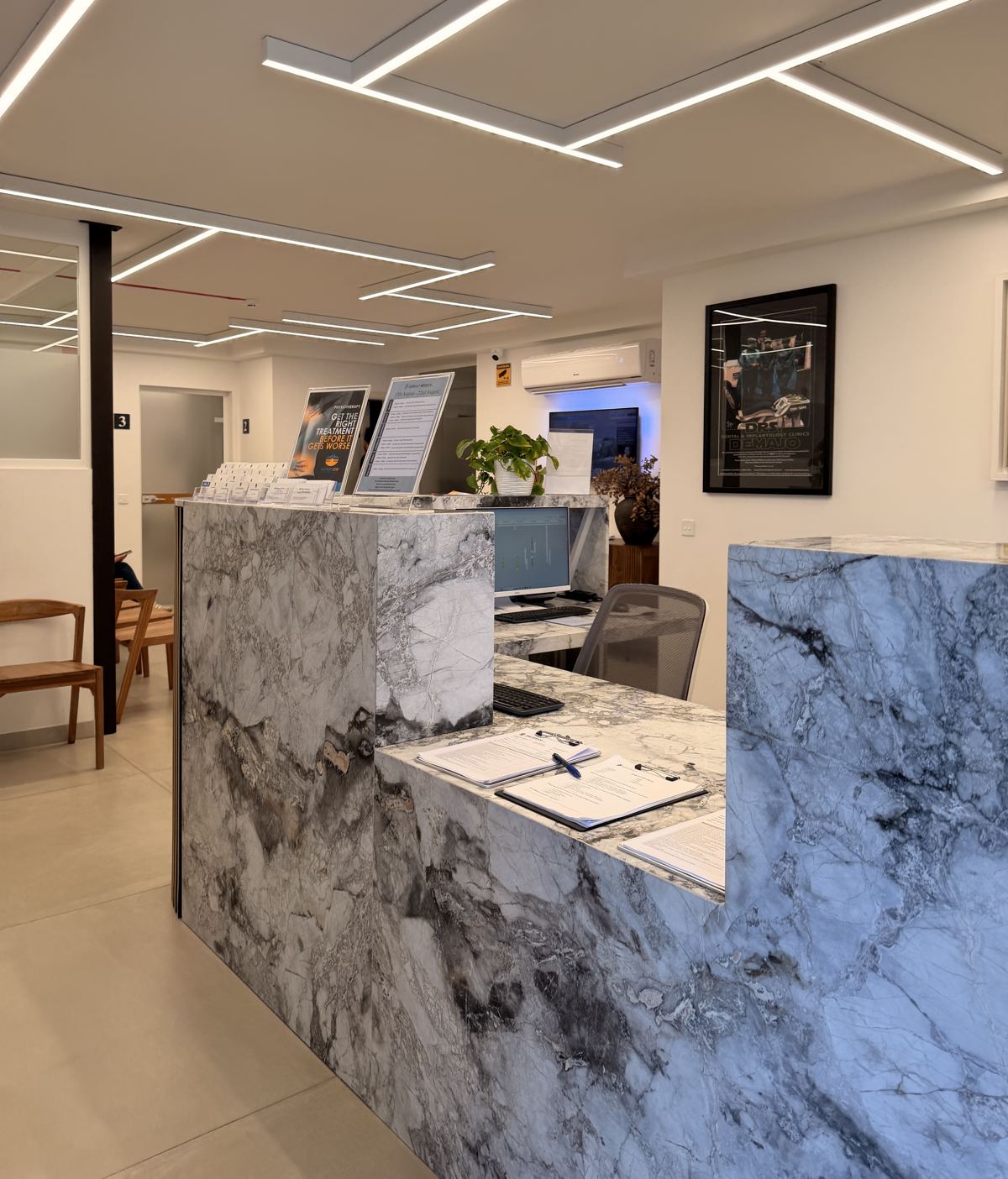 Marble reception desk at Demajo Medical