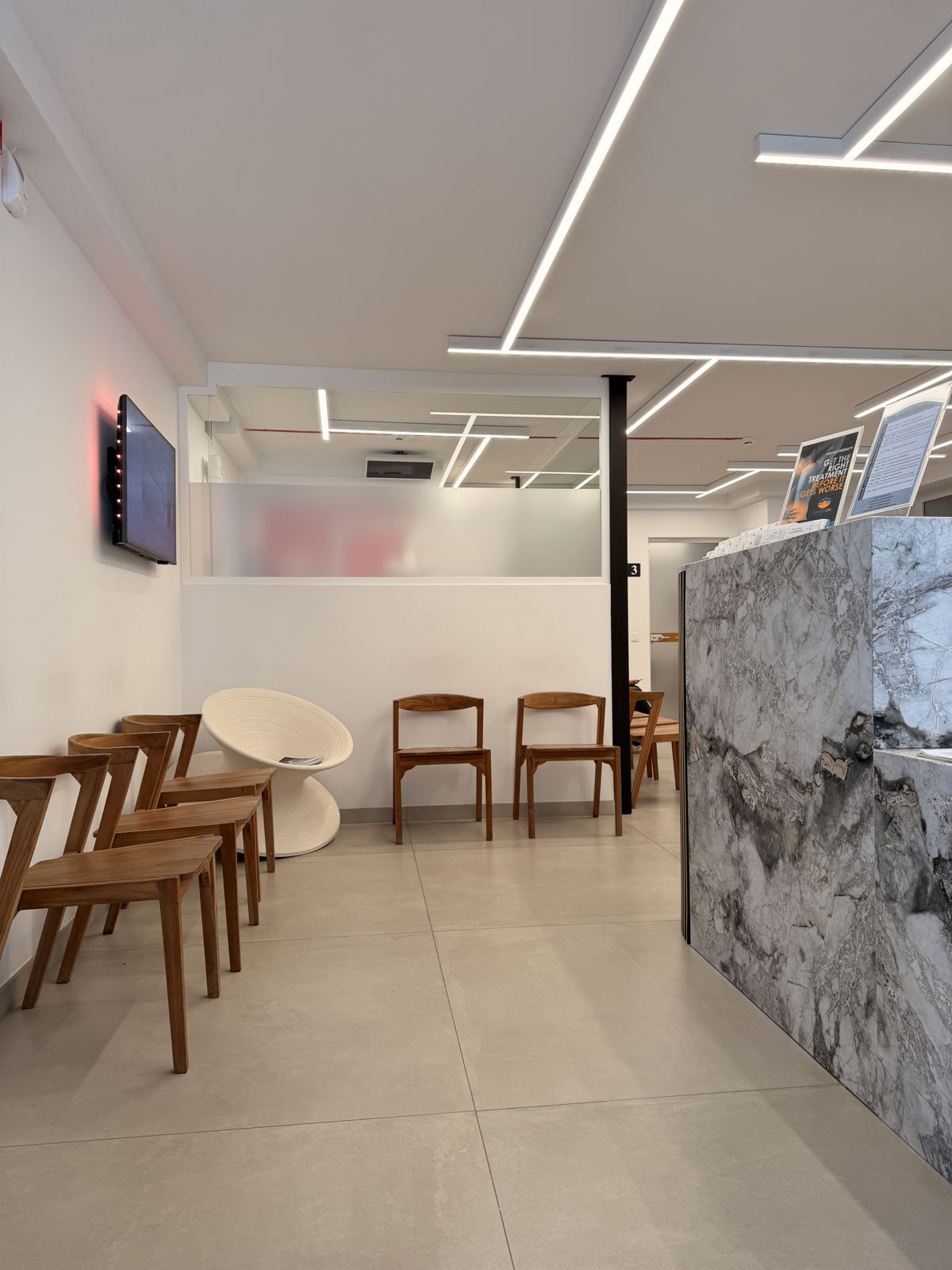 Waiting area beside the reception desk at Demajo Medical